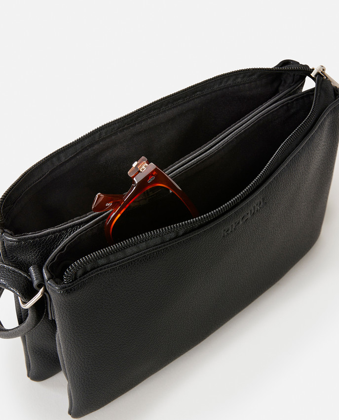 Borsa Rip Curl Mini Essential nera con tre scomparti e chiusura a zip, dimensioni 130 mm x 230 mm x 40 mm.