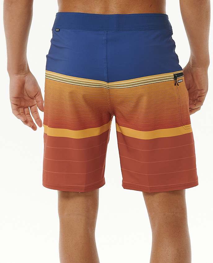 Boardshort Rip Curl Mirage Daybreaker con tessuto elastico e tasca laterale con zip.