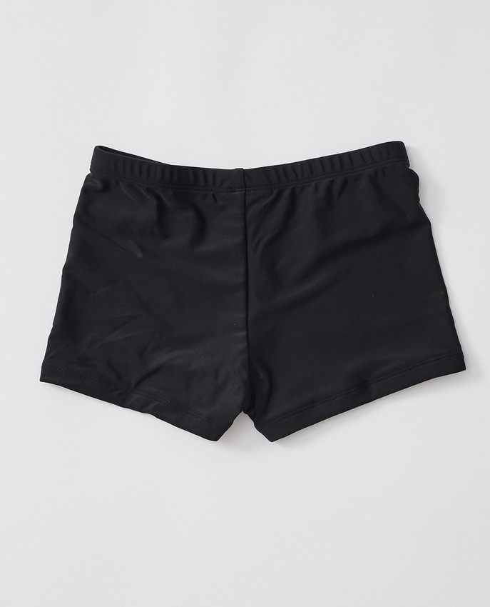 Costume Rip Curl Boyleg Sluggo, design boxer aderente nero con logo Rip Curl sul davanti.